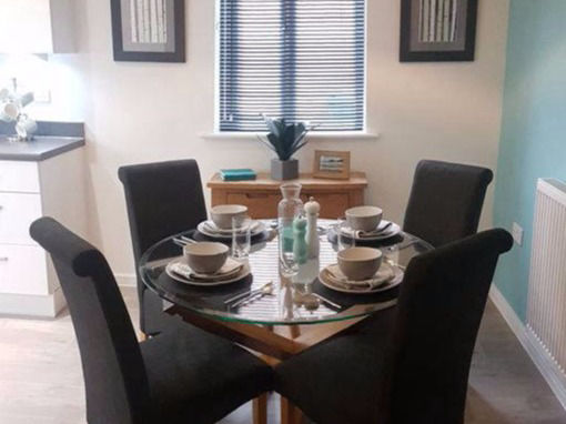 teal and grey showhome dining area