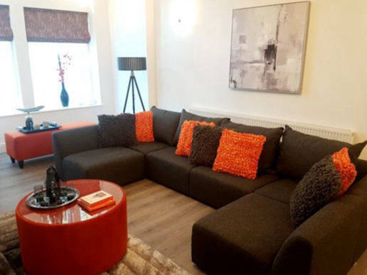orange and charcoal grey showhome design