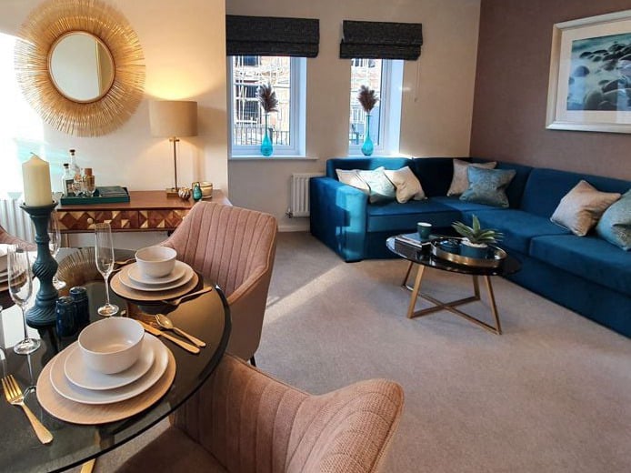 teal and soft gold showhome lounge diner