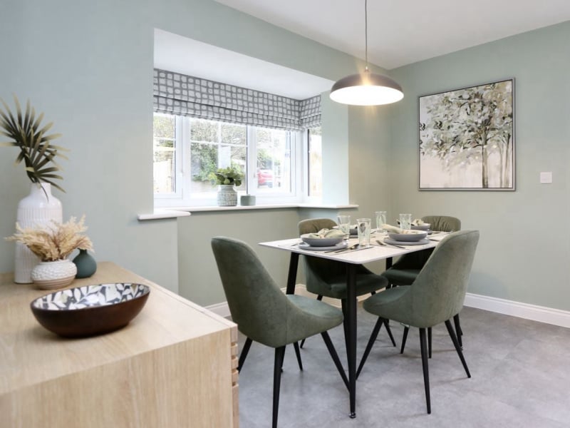 show home dining room in sage