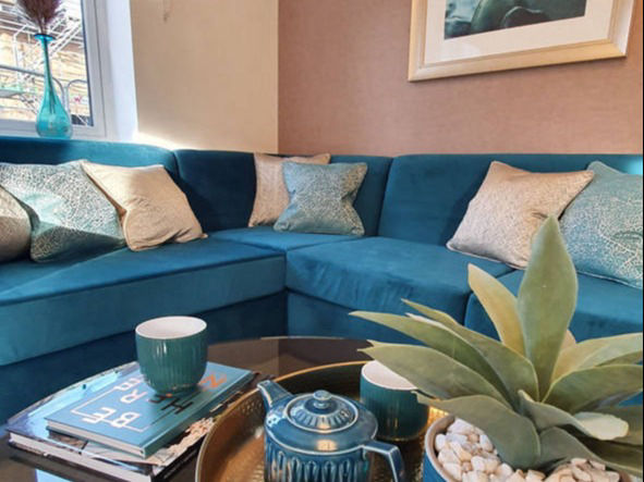 teal and soft gold lounge